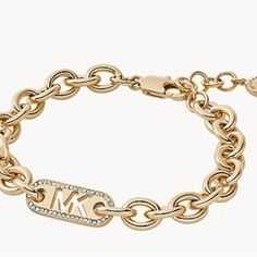 Michael Kors Bracelet Goldtone Brass Mkj8028710 Lobster Clasp Closure Measurements: Length: 178+50mm, Width: 23mm, Height: 9mm New In Box Classic Metal Jewelry With Logo Charm, Modern Metal Jewelry With Logo Charm, Formal Metal Jewelry With Logo Charm, Gold-tone Bracelet With Logo Charm, Elegant Metal Chain Bracelet With Logo Charm, Modern Gold Jewelry With Logo Charm, Michael Kors Bracelet, Michael Kors Jewelry, Womens Jewelry Bracelets