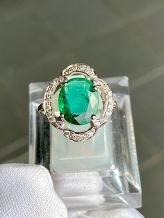 SALE For a limited time, save $370! with 10% off. Originally $3,700. Unique and one of a kind. Gorgeous deep emerald color. We utilize only oil as customary with natural emeralds, no treatments to any of the stones. Free Certification available upon request and Free Shipping. You get this actual ring, not a re-production. SETTING Metal: 18k White Gold Certificate: Including with Ring & free of charge. Ring Size: 6.25Size Selectable (4-9 US sizes) Appraised Value: $ 5000 USD MAIN STONES Type: Elegant Untreated Green Emerald Ring, Elegant Untreated Oval Emerald Ring, Oval Untreated Green Emerald Ring, Untreated Oval Green Emerald Ring, Gia Certified Green Emerald Ring, Gia Certified Emerald Ring, Gia Certified Oval Green Emerald Ring, Gia Certified Green Oval Emerald Ring, Gia Certified Oval Emerald Ring