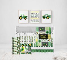 a baby crib bedding set with tractors, trucks and trees in green on it