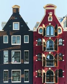 two buildings side by side in front of each other with windows and balconies