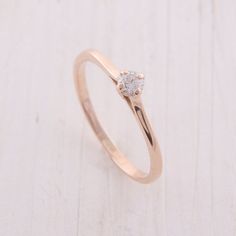 Rose Gold Simple Diamond Promise Ring, Simple Rose Gold Promise Ring, Simple Rose Gold Diamond Promise Ring, Simple Rose Gold Diamond Ring For Anniversary, Simple Rose Gold Anniversary Diamond Ring, Simple Rose Gold Ring With Single Diamond, Rose Gold Solitaire Midi Rings For Promise, Rose Gold Midi Ring With Single Diamond For Promise, Promise Ring Simple