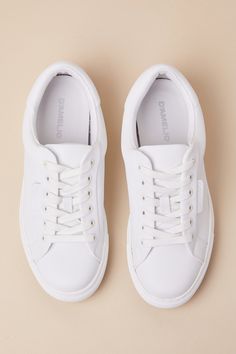 Casually dominate the top trends with every step in the D'Amelio Footwear Sono Bright White Leather Lace-Up Sneakers! Smooth genuine leather shapes these elevated sneakers with a rounded upper and a classic lace-up vamp with a padded tongue and white laces. The padded, low-cut collar tops a sporty bumper sole for a stylish-yet-functional look! Logo tag at the outstep and heel. 1" rubber heel. Cushioned insole. Rubber sole has nonskid markings. Genuine leather upper. Balance man made materials. I Classic Lace-up Platform Sneakers With Contrast Sole, Classic Platform Sneakers With Vulcanized Sole And Round Toe, Classic Lace-up Platform Sneakers With Textured Sole, Classic Lace-up Platform Sneakers, Classic Platform Sneakers With White Sole And Round Toe, Classic Cushioned Platform Sneakers With Round Toe, Classic Platform Sneakers With Cushioned Footbed, Everyday Lace-up Platform Sneakers With White Sole, Everyday Lace-up Platform Sneakers With Cushioned Footbed