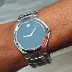 Men's Silver Black Dial Movado Watch. 40mm, Swiss Made, Push Button Deployment Clasp, Water Resistant To 30 Meters, Sapphire Crystal, Movado Dot @ 12o'clock Position,Bezel Is Silver, Dial Is Black. Box And Warranty Info Included Nwt Never Used. All Reasonable Offers Considered. John Fernandes, Movado Mens Watches, Movado Watch, Luxury Watches For Men, Black Box, Swiss Made, Silver Man, Push Button, Sapphire Crystal