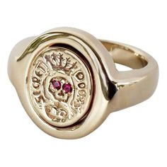 Crest Signet Ring Ruby Skull 14 karat Gold Victorian Style J DAUPHIN signature piece " Secret Doors" Hand made in Los Angeles Inspired by Memento Mori, medieval Latin Christian theory and practice of reflection on mortality. Which in Latin means "remember that you have to die", it symbolize the vanity of early life and the nature of all early goods and pursuit that are just temporary. Memento more has been a discipline of perfecting the character by cultivating detachment and turning the attention towards the immortality of the soul and the afterlife. J Dauphin jewelry is hand made in Los Angeles and was created by designer Johanna Dauphin. Most of the jewelry is unique or created in small series. Every gem is individually selected by hand. She started her career working for the Italian lu Rings Signet, Secret Doors, Chloë Sevigny, Mori Style, Diamond Skull, Diamond Signet Ring, Chloe Sevigny, Brand Ideas, Ring Ruby