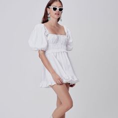 Prairie In The City: A Modern Take On Rustic Romance, A Fresh Mini Dress With A Shirred Front, Puff Sleeves And Feminine Ruffles. From For Love & Lemons For Victoria’s Secret: An Exclusive Collaboration That Blends Dreamy Confidence With Thoughtful Detailing, Giving Each Piece A Unique And Feminine Feel. Ribbon Detail At Front Square Neckline Hits Above Knees Hand Wash Separately And Dry With Care Imported Body: 97% Cotton, 3% Spandex Holiday Lingerie, Lemon Dress, Los Angeles Style, For Love & Lemons, Love And Lemons, Lace Mini Dress, For Love And Lemons, Floral Mini Dress, Favorite Dress