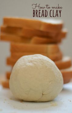 a ball of bread sitting on top of a counter next to sliced breadsticks