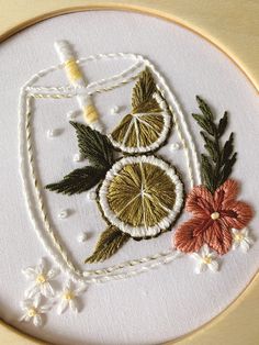 a close up of a embroidery on a hoop