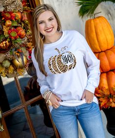 We are in love with this monogrammed leopard pumpkin graphic t-shirt! Make it your own by choosing from a t-shirt, v-neck t-shirt, long sleeve, tank top, or even a sweatshirt! We also offer your favorite brands Gildan, Bella Canvas or Comfort Colors! The options are endless!    break:specs  GILDAN Short Sleeve - 6.0 oz. pre-shrunk 100% cotton Long Sleeve - 6.0 oz. pre-shrunk 100% cotton V-Neck - 4.5 oz. pre-shrunk 100% ring spun cotton Tank Top - 5.3 oz. pre-shrunk 100% cotton Sweatshirt - 8 oz Fall Leopard Print Graphic T-shirt, Fall Leopard Print Cotton Tops, Leopard Print Cotton Tops For Fall, Fall Leopard Print Tops With Letter Design, Fall Leopard Print Top With Letter Details, Pumpkin Graphic, Monogram Shirt, Leopard Pumpkin, Fall Graphic