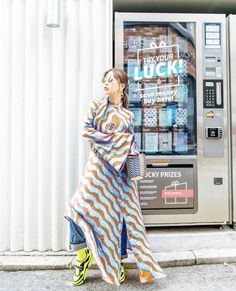 Nanjeong Lee with a Cesta Collective Lunchpail in Core Checkerboard. Two Piece Pant Set, Long Sleeve Dress