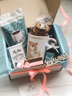 a gift box filled with coffee, cookies and other items for someone's special occasion