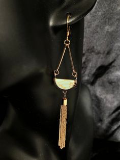 -Handmade Item -Style: Statement -Closure: Gold Ear Wire THESE EARRINGS WILL NOT BE RESTOCKED SO BUY THEM WHILE THEY ARE LISTED!! Fake turquoise, gold tassel dangle earrings. Statement peice! These earrings are lightweight. Packaged nicely in Satin. Turquoise Tassel Drop Earrings, Metal Tassel Dangle Earrings With Latkans, Elegant Turquoise Jewelry With Tassels, Tassel Dangle Chandelier Earrings As Gift, Tasseled Drop Earrings As Gift, Tassel Chandelier Dangle Earrings As Gift, Unique Dangle Tassel Jewelry, Gift Tassel Dangle Chandelier Earrings, Elegant Handmade Turquoise Tassel Earrings