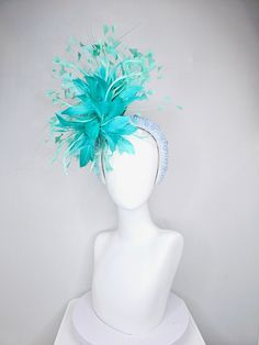 From the 2024 Featured Milliner of the Kentucky Derby Museum  Gorgeous Kentucky Derby hat fascinator  kentucky derby hat fascinator green feather flower and feathers with light blue pearl beaded headband headband attachment each hat is totally one of a kind! no two are alike! I can probably add feathers, flowers etc to existing hats for a small fee. I cannot remove anything from existing hats. Just message me and see if we can make it work! :) I cannot make custom order from scratch. My schedule Turquoise Headpiece For Kentucky Derby Races, Turquoise Headpieces For Kentucky Derby, Turquoise Headpiece For Summer Wedding, Turquoise Headpieces For Summer Weddings, Turquoise Summer Wedding Headpiece, Summer Wedding Turquoise Headpieces, Spring Turquoise Headpiece For Parties, Kentucky Derby Feather Trim Headband, Turquoise Headpieces For Spring Weddings