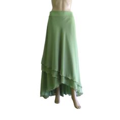 "It is made from soft and good quality Chiffon fabric. This is made to order in your measurements. Skirt length: 30\" x 40\".It can be made longer or shorter. It is made with a zipper. You can choose other colors from the color chart. When you order please give me your measurements: 1: The length of the skirt from the top of the waistline to the bottom hem. 2: Waist ( where you want the waistline to be). 3: Hips ( around the fullest part) 4: And your color choice. *When you order will have a pla Fitted Green Ruffled Maxi Skirt, Fitted Green Maxi Skirt With Ruffles, Green Stretch Flared Maxi Skirt, Flowy Green Gathered Skirt, Stretch Green Ruffled Skirt, Green Stretch Ruffled Skirt, Flowy Green Ruffled Skirt, Green Asymmetrical Flowy Wrap Skirt, Fitted Green Maxi Skirt With Gathered Detail