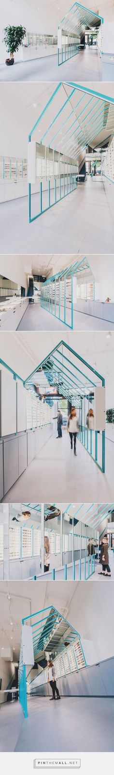 three different angles of the same building with blue and white lines on it, one in front of the other