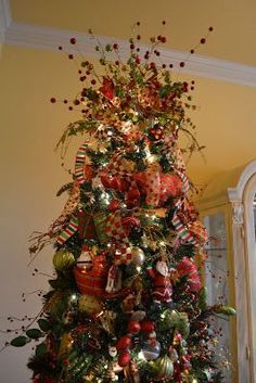 a decorated christmas tree with ornaments on it