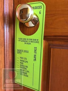 a door handle on a wooden door with a green sticker stating it is safe