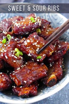 a bowl filled with meat and sesame seeds