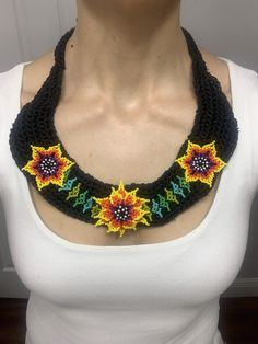 Beautiful hand made thread necklace with beaded flowers Beaded Multicolor Flower Necklace For Beach, Bohemian Flower Necklace With Round Beads For Beach, Bohemian Beach Flower Necklace With Round Beads, Colorful Beaded Flower Necklace For The Beach, Colorful Beaded Flower Necklace For Beach, Adjustable Bohemian Flower Necklace, Colorful Flower Necklace For Beach, Adjustable Beaded Necklace With Flower Pendant, Adjustable Artisan Flower Necklace