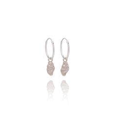 These super cute Dainty Shell Earrings are made by hand from a real baby whelk shell using '999' fine silver & hang from fine quality sterling silver French hooks or endless hinged hoops. *The approximate drop length is 1.5cm *Please choose hook or hoop at checkout *Presented in a luxury branded gift box This would make the perfect gift for a nature lover & is eco friendly too as Fine Silver is a recycled material. Beautifully packaged in eco-friendly, recycled & recyclable materials & posted to Handmade Silver Shell Earrings, Handmade Silver Shell-shaped Earrings, Handmade Silver Shell Drop Earrings, Adjustable Silver Shell-shaped Earrings, Sterling Silver Shell As Gift, Silver Shell-shaped Earrings With Ear Wire, Nickel-free Sterling Silver Shell-shaped Earrings, Nickel-free Shell-shaped Sterling Silver Earrings, Sterling Silver Shell Earrings For Gift