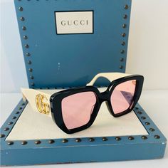 Gucci Sunglasses. Series Number: Gg0956s. Color Code: 002. Shape: Geometric. Lens Width: 54 Mm. Lens Bridge: 19 Mm. Arm Length: 145 Mm. 100% Uv Protection. Frame Material: Plastic. Frame Color: Black;White. Lenses Type: Pink. Rim Style: Full-Rim. Gucci Pink Geometric Ladies Sunglasses Gg0956s 002 54. Manufacturer's Packaging Included. Packaging Size And Color May Vary. General Frame Color Black;White Information Brand Gucci Gender Womens Model Gg0956s 002 54 Details Series Number Gg0956s Color C Pink Mirrored Sunglasses For Evening, Designer White Glass Sunglasses, Luxury Pink Sunglasses With Uva Protection, Trendy Pink Sunglasses For Evening, Gucci Pink Sunglasses With Uv Protection, Pink Gucci Sunglasses With Uv Protection, Luxury Pink Glass Sunglasses, Designer Pink Sunglasses For Evening, Pink Sunglasses With Uv Protection