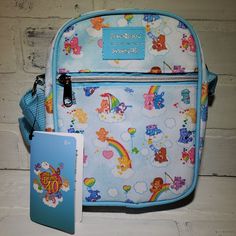 Loungefly Care Bear Cross Body Bag *Brand: Loungefly *Color: Multi, Care Bear And Cousins *Interior: Blue *Front Exterior Front Pocket With Zipper Closer *Interior Open/Slip Pocket *Est. Measurements: 8" X 2" X6.5" *New With Tags Blue Shoulder Bag With Zipper Closure As Gift, Blue Shoulder Bag With Zipper Closure, Ideal As Gift, Blue Pouch Satchel For School, Blue Bag With Zipper Pocket For Gift, Blue Bag With Zipper Pocket As Gift, Harry Potter Bag, Loungefly Hello Kitty, Sleeping Beauty Maleficent, Princess Book