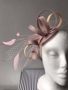 DESCRIPTION - pink and black with net/veil and feathers sinamay fascinator - Handmade in UK - Made to order in OTHER COLOURS , see colour drop down menu. - Many more items like this are available in our shop please have a look. - If you need your item by a certain date please contact me.  - If you are not happy with your item please contact me and i will do everything i can to rectify    it. *Please note that dummy heads are smaller than a ladies actual head size. RETURNS - I gladly accept retur Fitted Tulle Headpieces For Parties, Tulle Fascinator For Royal Ascot, Pink Feathered Fascinator For Evening, Pink Structured Crown Fascinator For Evening, Pink Feathered Headpieces For Evening, Pink Evening Fascinator, Luxury Pink Fascinator, Pink Adjustable Fascinator, Elegant Pink Curved Brim Fascinator