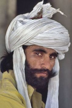 a man with a white turban on his head