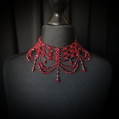 Elevate your bridal elegance with our exquisite Victorian-inspired dark red necklace, a vintage masterpiece fit for the timeless charm of your wedding day.  This intricately crafted piece, adorned with crystal red beads captures the essence of romance. The Florence necklace is a perfect blend of sophistication and vintage allure, ensuring you shine with grace on your special day. Make a statement that transcends time with this captivating bridal accessory. Blood Choker, Blood Necklace, Rosy The Rascal, Vintage Bridal Necklace, Biblically Accurate, Red Choker, Aesthetic Photoshoot, Angel Outfit, Bridal Choker