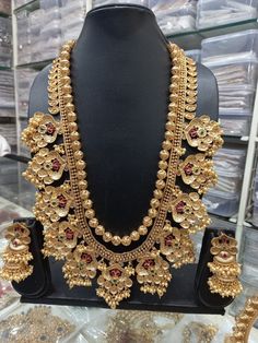 Gold Plated High Quality Long Haram Jewelry Set available in 5 different designs. Luxury Gold Long Temple Necklace, Luxury Long Temple Necklace, Earrings Jhumka, Long Haram, Temple Jewelry, Jewelry Set Design, Bollywood Style, Wedding Jewellery Necklace, Temple Jewellery