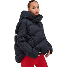 The Perfect Moment Orelle Short Down Jacket is perfect for strolling down mountain-town main streets and big-city boulevards in style. The oversized fit features a high-neck collar that keeps us cozy as winter winds begin to blow and flakes begin to fall. The jacket is stuffed with light and lofty 700-fill goose down, so we can brave frigid temperatures with ease. Functional Puffer Jacket For Winter Sports In Fall, Fall Outdoor Outerwear With Funnel Neck, Fall Funnel Neck Outerwear For Outdoor, Fall Funnel Neck Outdoor Outerwear, Down Puffer Jacket For Winter Sports In Fall, Oversized Puffer Jacket For Fall Outdoor Activities, Oversized Fall Puffer Jacket For Outdoor Activities, Sporty Puffer Jacket For Cold Weather And Fall, Oversized Puffer Jacket For Fall Outdoor