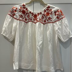 Thml Embroidered Burnt Orange Top Size Xs; Nwot Mint Condition Never Worn; Key Hole Single Opening Button On Back Neck White Short Sleeve Top With Embroidered Hem, White Embroidered Hem Top With Short Sleeves, Spring Crew Neck Top With Embroidered Neckline, Spring Embroidered Neckline Crew Neck Top, White Embroidered Neckline Top For Summer, White Casual Top With Embroidered Neckline, Casual White Tops With Embroidered Neckline, Summer White Blouse With Tonal Embroidery, Casual White Top With Embroidered Neckline