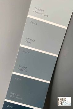 some gray and blue paint colors on the wall