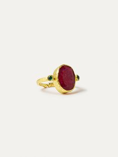 Let your fingers take center stage with this captivating red stone ring. Crafted with an adjustable gold band, this cocktail ring is hand-set with an oval shaped ruby semi-precious stone and petite green cubic zirconia gems. Kemp Ring, Ruby Cocktail, Hand Jewelry Rings, Red Stone Ring, Friendship Rings, Evil Eye Ring, Ring Stack, Hand Ring, Pierced Jewelry