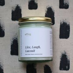 Why live, laugh, love when you can live, laugh lawsuit? The perfect gift for lawyers is here! Available for a limited time, this candle is the perfect corporate gift for lawyers and law firms. The jury is out: this candle smells amazing. Please note: this candle shares the same fragrance as our Warm Hugs and our limited-edition I Understand The Assignment candles. Fragrance Notes:TOP: Saffron, White TeaMIDDLE: Orchid, TobaccoBASE: Vanilla, Almond Milk, Tonka Bean Burn time: 45 hours Gift For Lawyer, Candles Fragrance, Candle Smells, Lawyer Gifts, Funny Candles, Candle Smell, Warm Hug, Tonka Bean, In Law Suite