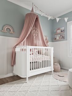 A nursery that dreams are made ofWhat are some of your favourite small businesses for nursery decorLet's share the love and tag them below@three.little.poppies s://www.thefeltingdorcas.com.au/baby-mobiles Corner Crib Nursery, Calming Nursery, Girly Nursery, Dreamy Nursery, Baby Nurseries, Crib Canopy, Fun Nursery, Baby Mobiles, Nursery Room Inspiration