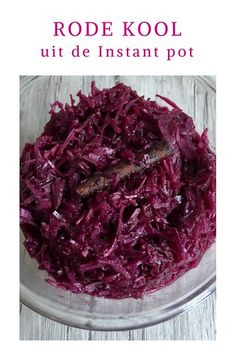 red cabbage in a glass bowl on a white wooden table with the title rode kool utt de instant pot