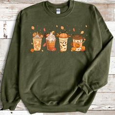 Fall Coffee Sweatshirt for Women, Vintage Thanksgiving Sweater, Fall Crewneck Pumpkin Spice Sweatshirt Introducing our cozy and stylish Fall Coffee Pumpkin Spice Sweatshirt, the ultimate must-have for the upcoming autumn season! Embrace the warmth and charm of fall while sipping your favorite pumpkin spice latte in this delightful sweatshirt. Design: Our sweatshirt features a rich, earthy color palette inspired by the changing leaves of fall. The base color is a warm, inviting shade of pumpkin o Coffee Colored Tops With Letter Print For Fall, Coffee Letter Print Tops For Fall, Coffee Crew Neck Top For Loungewear, Coffee Color Crew Neck Top, Relaxed Fit Coffee Color Tops For Fall, Coffee Color Cotton Sweatshirt For Fall, Coffee Cotton Sweatshirt For Fall, Fall Cotton Coffee Sweatshirt, Coffee-colored Graphic Print Sweatshirt For Fall