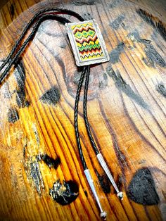 This bolo tie is a very unique item with its beaded design. .925 sterling silver Native American hand made Beaded Bolo Ties, Southwestern Style Adjustable Bolo Tie, Native American Bolo Ties, Handmade Adjustable Unique Bolo Ties, Silver Sterling Bolo Tie, Bolo Tie, Native American Jewelry, Native American, 925 Sterling Silver