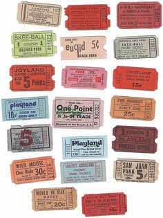 some old movie tickets sitting on top of each other in front of a white background