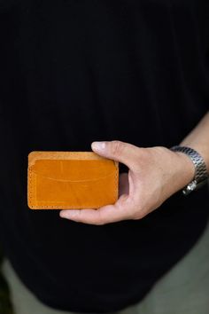 Kelal Card Wallet is designed with simplicity in mind. Its 2-slot construction allows you to carry credit cards, ID and business cards, eliminating unnecessary bulk and clutter. Dimensions: 4.3" L x 2.3" H Features: • Crafted from premium Ethiopian leather. • Please note that since leather is a natural material, each product can have slight color and grain variations. Leather Rectangular Card Holder With Card Slots, Minimalist Bifold Card Holder With Slots, Minimalist Bifold Card Holder With Card Slots, Minimalist Rectangular Card Holder With Slots, Minimalist Rectangular Card Holder With Card Slots, Leather Card Holder With Slots, Leather Card Holder With Card Slots, Rectangular Rfid Blocking Card Holder For Personal Use, Everyday Rectangular Wallets With Id Window