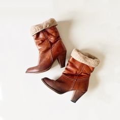 Rust brown pull-on heeled boots. These booties have cream fleece lining which makes them perfect for winter! Classic design allows for these to be worn with a variety of outfits. They have multiple twill straps to help pull the boot on [last image]. I would keep these for myself if they weren't a half size too small-- I can get them on as a 5.5/6, but they are too tight for true wearing, definitely fit as a 5. Cutest vintage boots- adore the look of wooden heels! Found in Michigan. Size: 5, exac Womens Booties, Wooden Heels, Brogue Boots, Brown Leather Ankle Boots, Booties Ankle Boots, Gogo Boots, Leather Brogues, Chunky Heels Boots, Block Heel Boots