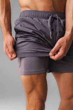 Our React Run Short is the perfect sporty short for any activity. This short has a built in liner short for maximum coverage, comfort, & versatility. Yoga Wellness, Lycra Men, Sporty Shorts, Running Short, Sports Shorts, Clothing Ideas, Running Shorts, Sport Shorts, Shorts With Pockets