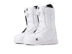 a pair of white snowboard boots sitting on top of each other