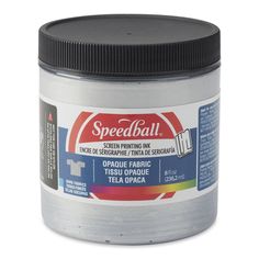 a jar of paint that is silver with black lid and the words speedball on it