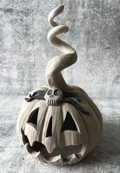 a carved pumpkin with a skeleton on it