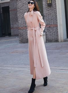 "This woman long wool coat in pink is a timeless winter piece that will add a divine pop of color to your winter wardrobe. This coat is a stunning color, lovely length, and keeps me warm. Endlessly versatile, layer it over jeans and sweaters or sleek dresses for countless styling options. FEATURES 50% wool blend, 50% polyester Polyester lining Single breasted coat A Line Belted coat Long sleeve High collar Two side pockets Perfect for winter, autumn Dry clean More colors select from (Photo L1) h Long Wool Coat For Spring, Spring Wool Coat In Solid Color, Elegant Full-length Outerwear For Fall, Elegant Full Length Outerwear For Fall, Spring Long Wool Coat Solid Color, Spring Long Wool Coat In Solid Color, Elegant Pink Single Breasted Wool Coat, Pink Single Breasted Wool Coat For Fall, Pink Long Wool Coat For Winter