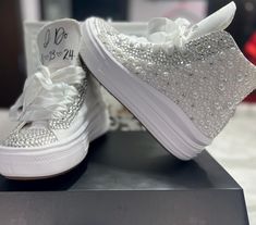 Custom made Platform Converse's for the bride. Each sneaker is made with pearls and rhinestones for the ultimate bridal gift! In the personalized section, please indicate, the date of your wedding and your married last name. Elegant Wedding Sneakers With Rhinestones, White Custom Sneakers With Rhinestones For Wedding, Silver Sneakers For Wedding With Round Toe, Silver Lace-up Sneakers For Wedding, Custom Wedding Sneakers With Rhinestones, Wedding Custom Sneakers With Rhinestones And Round Toe, Wedding Low-top Sneakers With Rhinestones, Wedding Lace-up Sneakers With Rhinestones, Bride's Low-top Wedding Shoes With Rhinestones