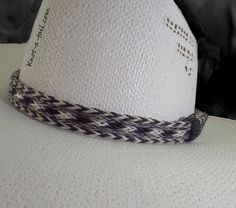 Beautiful Cowboy hat band,  Just look at this stunning design with matching   gray and black whip-stitched edge of  hand-braided genuine Horsehair COLOR: Rich gray and a deep black horsehair  Unique, distinctive and exceptional quality  Cowboy horsehair hat band! * Everything you want in a Horsehair hat band.  * This is a 5 strand horsehair hat and that is about 5/8 inches wide. * Easy adjusts.  You will find it easy to adjust to fit most any size hat with the two sliding knots.    Brings out yo Horse Hair Hat Band, Cowboy Hat Band, Horse Hair Braiding, Rodeo Style, Cowboy Hat Bands, Hat Bands, Western Hat, Chapeau Cowboy, Rodeo Fashion