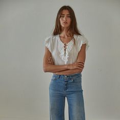 A sweet little top ready to take you from summer to fall. 100% cotton Care: hand wash / hang dry Relaxed Summer Tops With Frayed Hem, Chic Relaxed Fit Top With Frayed Hem, Chic Tops With Frayed Hem And Relaxed Fit, Relaxed Fit Washed Tops For Daywear, Relaxed Cotton Tops With Frayed Hem, Chic Light Blue Cotton Blouse, Light Wash Tops For Casual Spring Gatherings, Spring Tops With Frayed Hem For Casual Gatherings, Summer Tops With Frayed Hem In Relaxed Fit