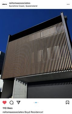 an image of a building with wooden slats on it